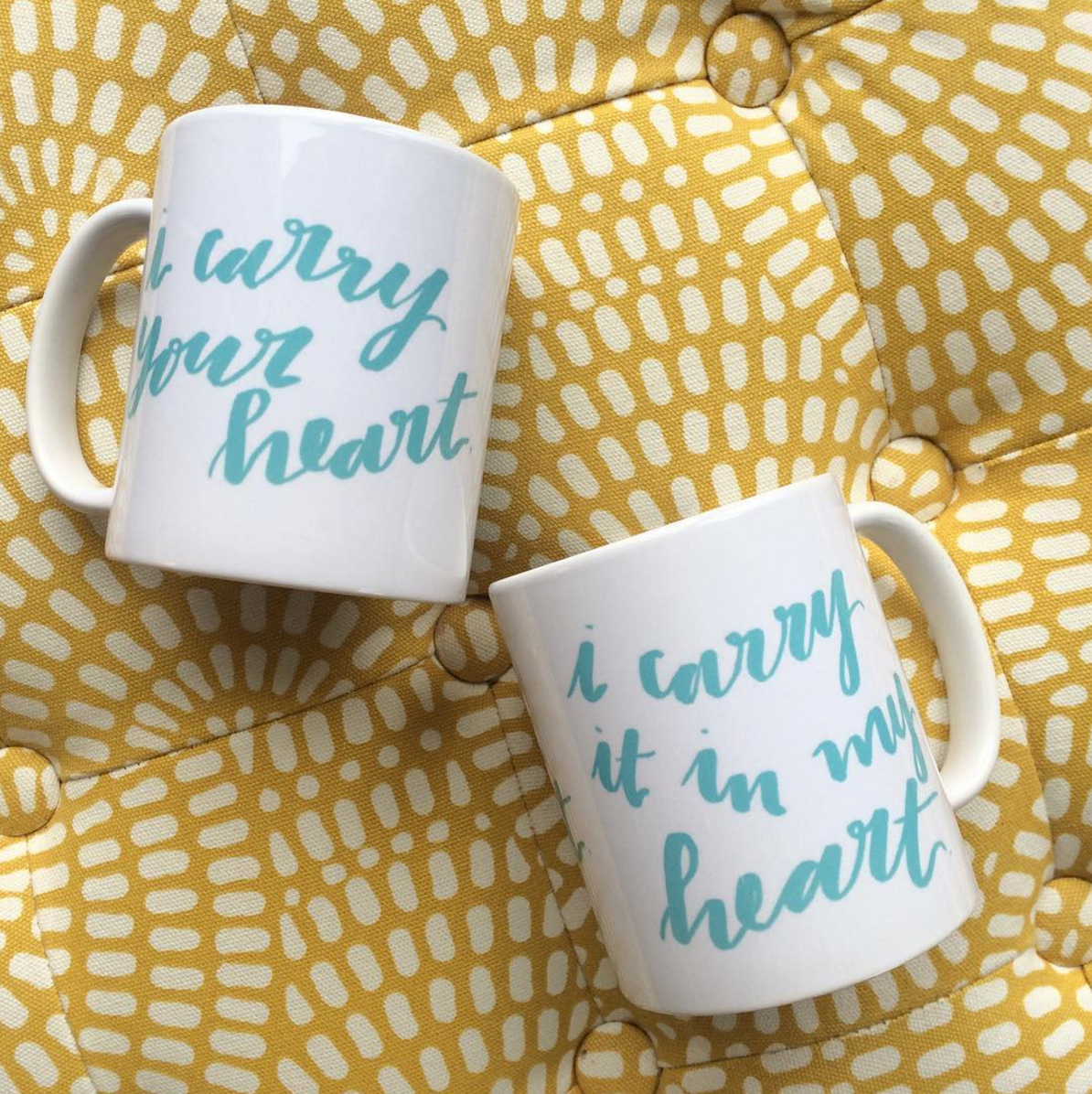 Lettering example of mug with ee cummings quote I carry your heart